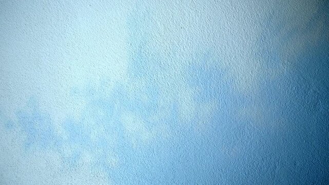 4K Minimal silhouette shadow light of tropical leaves swaying in the wind on aqua blue color clean cement wall background in slow motion. for summer, healthy concept