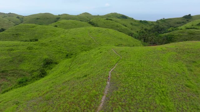 Nusa Penida Indonesia Scenic Drone View of Teletubbies Hills Under Blue Skies