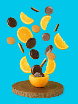 Jaffa Cake and Orange Slices Emerging from a Fresh Orange