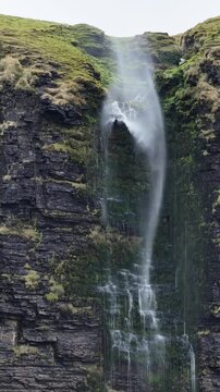 Waterfall running upwards - The Devils Chimney near Glencar Lough, Ireland