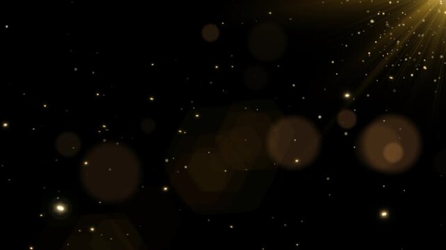 Golden particles drift slowly through a dark void while soft light leaks create a warm and elegant atmosphere for digital backgrounds.