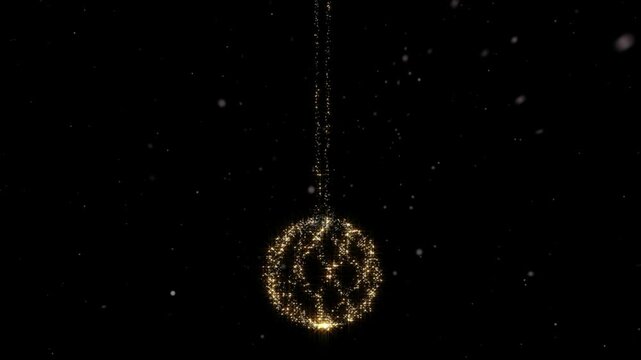 Ornament hanging from a string glows with intricate golden light patterns against a dark backdrop.
