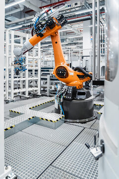 Automated robotic arm in manufacturing industry