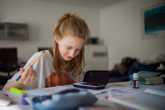 Girl learning at home