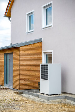 Germany, Bavaria, Odelzhausen, Heat pump outside modern single-family house