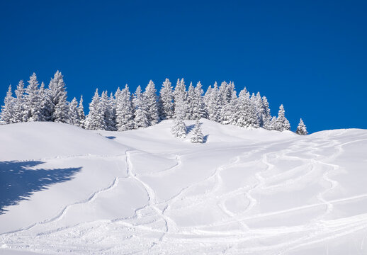 Germany, Upper Bavaria, Lenggries, ski area at Brauneck with ski tracks on the slope