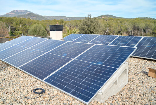 Solar panels installed on rooftop of house