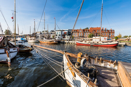 Germany, Mecklenburg-Western Pomerania, Greifswald, Sailing ships moored in harbor