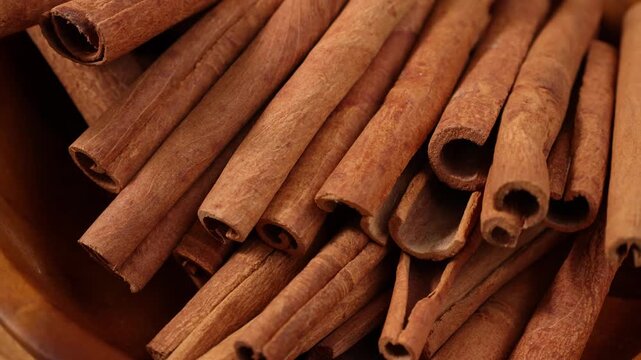 Close-up of dried cinnamon in a cup.