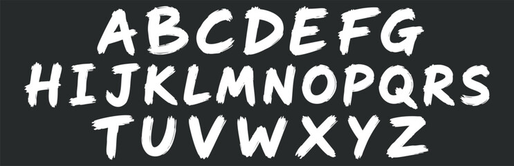 Uppercase English alphabet letters from A to Z written in white chalk on a blackboard with a rough, hand-drawn texture. © Zbrake Studio