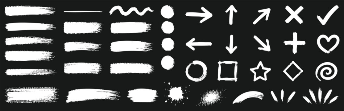 Collection of hand-drawn white chalk symbols, arrows, and decorative elements arranged on a dark textured blackboard background.