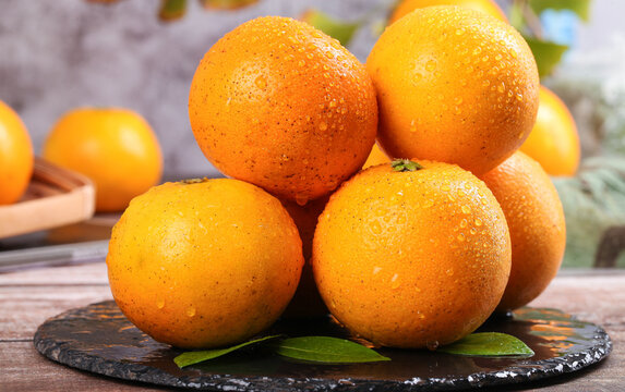 Fresh Orange Citrus Fruits with Water Droplets on Slate Board - Natural Healthy Food Photography