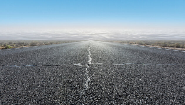 Heat Wave Shimmer on Empty Asphalt Road