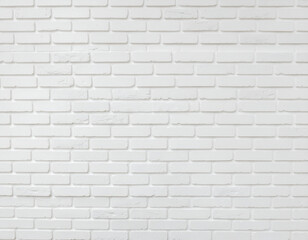 Fototapeta premium A close-up view showcases a pristine white brick wall, highlighting the texture and subtle variations in the brickwork, creating a clean and minimalist aesthetic.