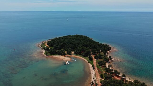Beautiful green peninsula at Cervar Beach located between Novigrad and Porec in the Adriatic Sea. Aerial