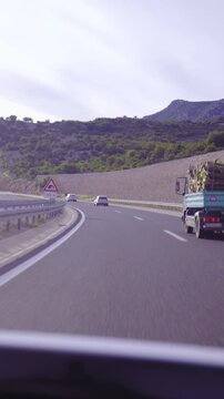 Taking over green truck on highway