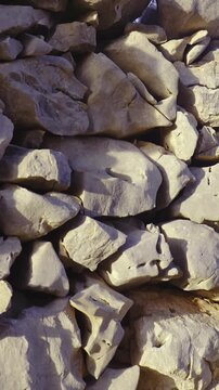 Dry stone wall dolly slide