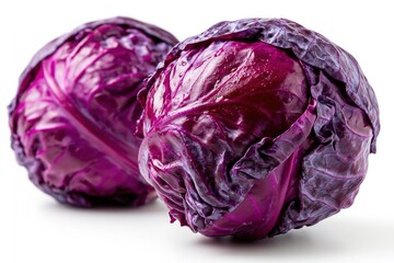 Obraz premium Vibrant Pair of Fresh Red Cabbages Isolated on White Background, Healthy Food Ingredient