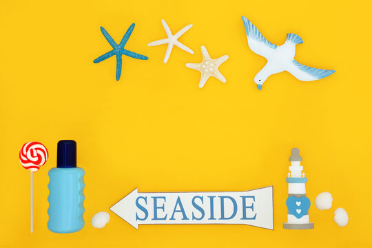 Fun at the seaside summer holiday symbols with sign, suntan lotion, shells, lighthouse, lollipop and seagull on yellow background. Abstract design with blue bottle. 