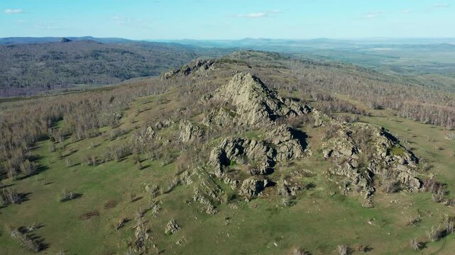 Southern Urals in spring: Yanguziai mountain of the Irendyk ridge. Aerial view.