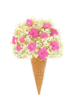 Surreal elder flower ice cream cornet summer fun design with waffle cone. Food art frothy scoop waffle cone decoration for logo or greeting card on white background.