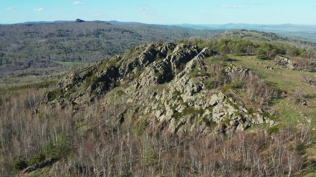Southern Urals in spring: Yanguziai mountain of the Irendyk ridge. Aerial view.
