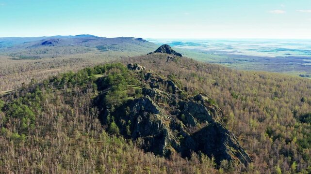 Southern Urals in spring: Yanguziai mountain of the Irendyk ridge. Aerial view.