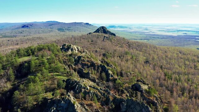 Southern Urals in spring: Yanguziai mountain of the Irendyk ridge. Aerial view.