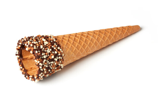 Waffle cone with chocolate and sprinkles isolated