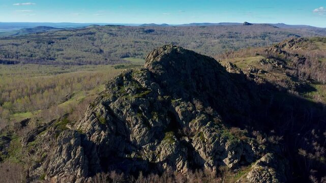 Southern Urals in spring: Yanguziai mountain of the Irendyk ridge. Aerial view.