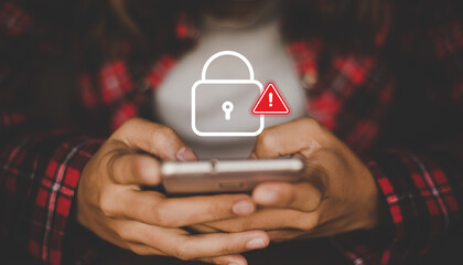 Smartphone Security Warning with Lock Icon While User Holding Mobile Phone in Hands © Divyesh