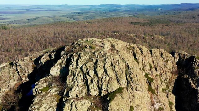 Southern Urals in spring: Yanguziai mountain of the Irendyk ridge. Aerial view.