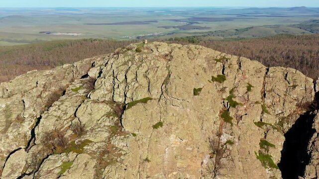 Southern Urals in spring: Yanguziai mountain of the Irendyk ridge. Aerial view.