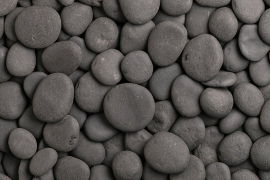 Smooth dark grey basalt stones texture wallpaper