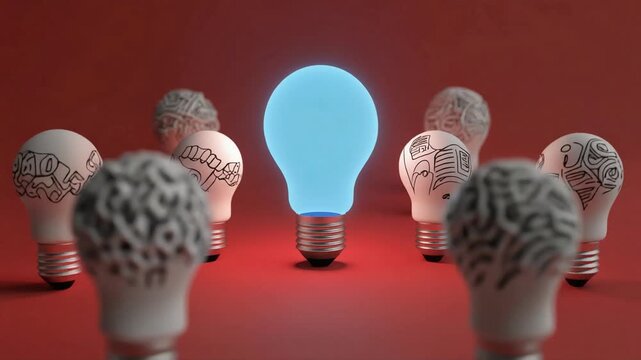 Glowing blue light bulb standing out among hand drawn scribbled light bulbs in this creative digital motion animation clip