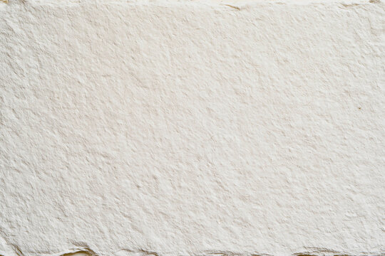 Premium white artisanal handmade paper sheet texture background