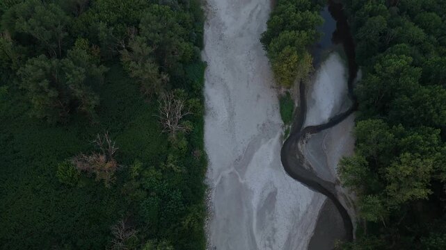 River Po exhibiting severely reduced water levels and exposed riverbeds from an intense summer heatwave and drought. Significantly diminishing the water flow through Lombardy and Emilia Romagna. Italy
