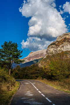 Driving through the Selva de Oza forest in Valley of Hecho, Aragonese Pyrenees, Huesca Province in Spain