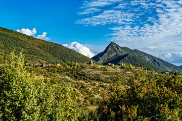 Fototapeta premium Driving through the beautiful landscape of Buerba in Ordesa Valley in the Pyrenees, Aragon, Spain