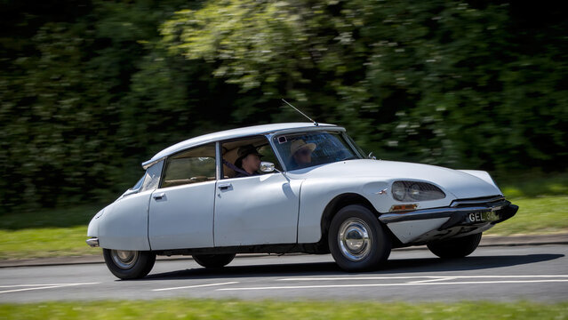 Milton Keynes,Bucks,UK - June 18th 2026: 1972 white Citroen DS classic car driving on a British road