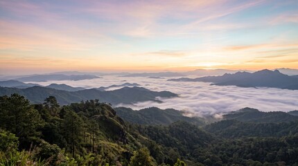 Fototapeta premium Sunrise Over Misty Mountain Forest Landscape.