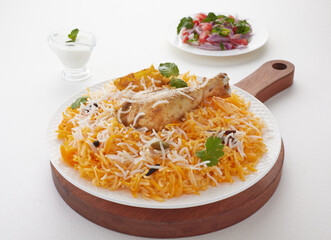 Delhi Style Chicken Biryani, low spicy but too much tasty. Prepared by finest quality basmati rice, chicken meat, cardamoms and other spices. © foody