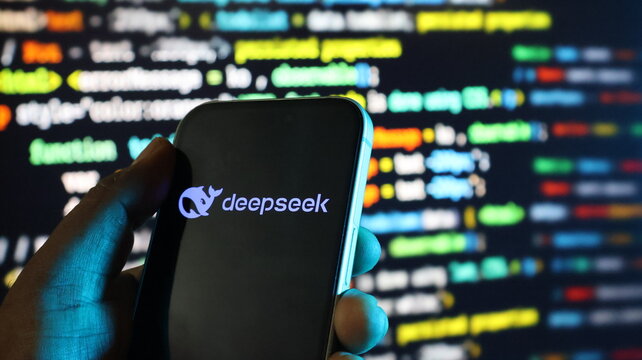 Person holding smartphone with deepseek logo, digital code on background, ai technology.