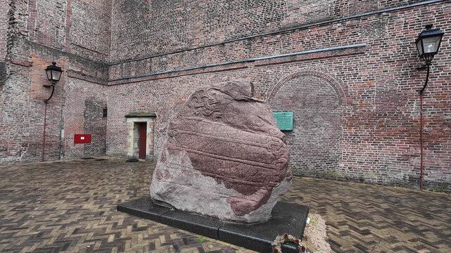 UTRECHT, NETHERLANDS  Jelling Rune Stone copy next to the Saint Martin Cathedral entrance