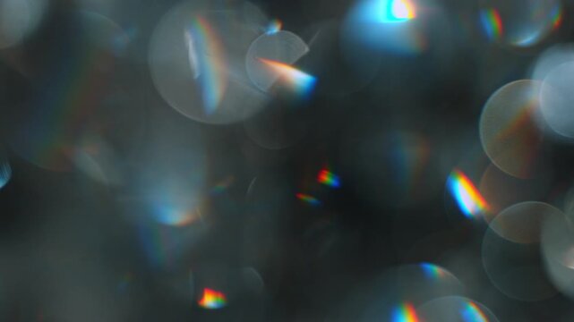 Real Shooted Cinematic Light Bokeh Overlay on Black Background in Slow Motion.