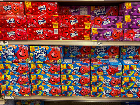 Texas, USA - April 15, 2024:  Various flavors of Kool-Aid Jammers juice pouches cases on the store shelves in a supermarket. Texas, USA.