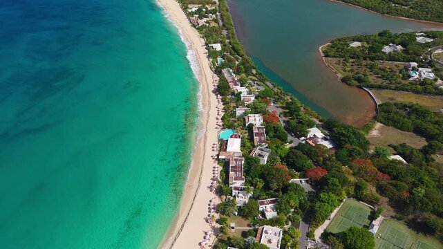 Saint Martin aka Sint Maarten Island, Drone Shot of Long Beach Sandy SHore and Beachfront Buildings by Caribbean Sea