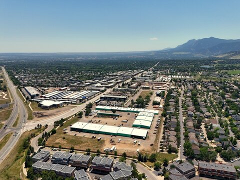 Aerial view of the suburban landscape and commercial buildings in Boulder, Colorado, United States.