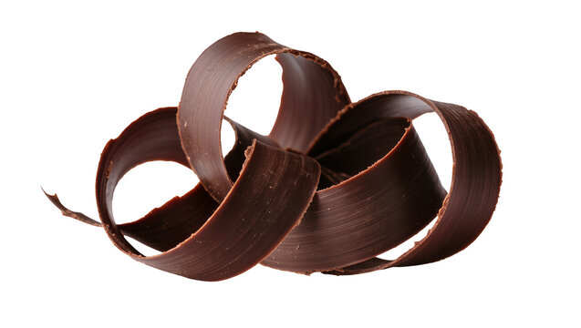 Isolated delicious dark chocolate curls for gourmet dessert decoration and sweet baking topping.