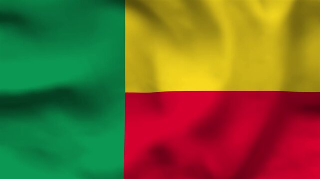 Benin national flag on wavy fabric, top view. Realistic textile texture with green, yellow, and red stripes in a clean flat lay.